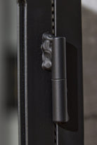 Industrial Mirrored Double Door Bathroom Cabinet - Matt Black close up of hinge