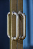 Industrial Mirrored Double Door Bathroom Cabinet - Antique Brass close up of handle