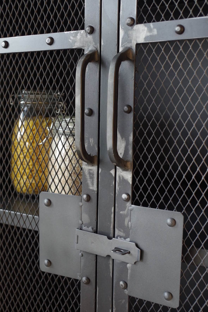 Industrial grey Mesh Cupboard with 3 shelves and lockable doors.