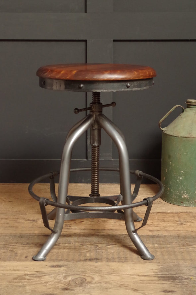 Industrial style Machine Shop Stool. Metal frame and wooden seat.
