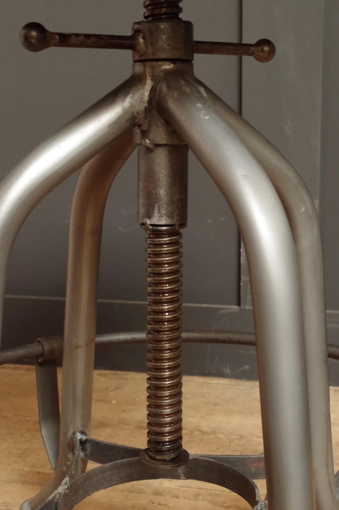 Industrial style Machine Shop Stool. Metal frame and wooden seat.